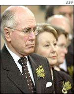 Australian Prime Minister John Howard (left) with his wife Janette attend a national day of mourning service in Canberra