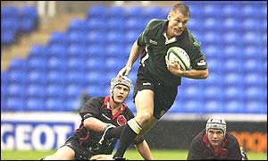 London Irish's Michael Horak sprints away from the Edinburgh tacklers