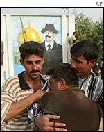 Released prisoner hugs relatives