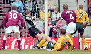 Henrik Larsson scores Celtic's third goal after 36 minutes