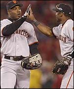 San Francisco's Barry Bonds and Reggie Sanders.