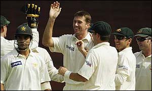 McGrath celebrates with team-mates