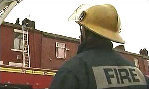 Firefighters assessing the minimal damage caused by the quakes