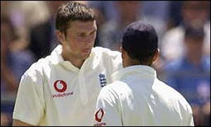 England captain Nasser Hussain offers some advice to the wayward Steve Harmison