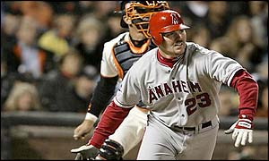 Scott Spiezio hits a two-run triple as the Anaheim Angels take control