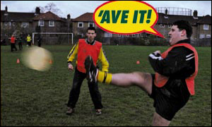 The poster at the centre of the row, featuring comedy star Peter Kay