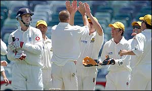 John Crawley returns to the pavilion as Western Australia celebrate another wicket