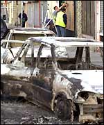 Burnt out cars on the streets of Burnley following rioting