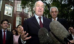 John Reid is questioned by the media about his new job