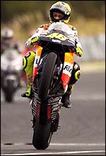 Valentino Rossi celebrates victory in the Australian MotoGP