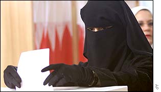 A woman, dressed in an Abaya, votes in Bahrain's election last week
