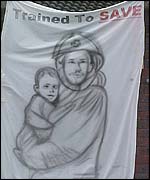 Protest poster outside fire station in Luton, Bedfordshire