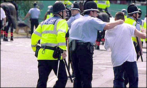 Police tackle football hooligan