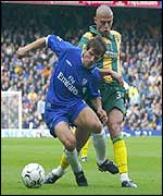 Gianfranco Zola and Neil Clement battle it out