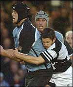 Cardiff's John Tait is tackled by Gareth Wyatt