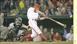 Centre-fielder Darin Erstad's solo home run brings the Edison Field crowd to their feet as the Angels fight back to 5-4