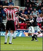 Southampton's James Beattie watches as Lee Clark gives Fulham the lead