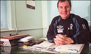 Joe Royle sits proudly behind his desk after joining them in November 1994