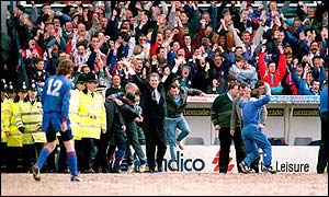 Joe Royle celebrates seeing Oldham stay in the Premiership on the last day of the season