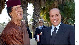 Muammar Gaddafi and Silvio Berlusconi