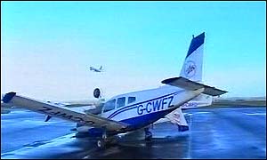 A damaged light aircraft at Cardiff International Airport