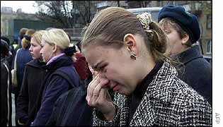 Relative weeps as she awaits news outside a Moscow hospital