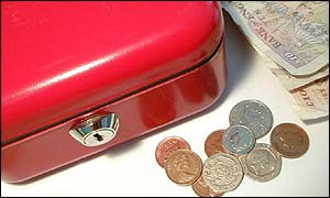 A moneybox notes and coins