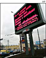 A road sign displays President Putin's address to the nation