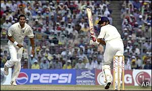 India's Sanjay Bangar flicks the ball out to the boundary 