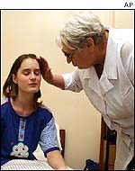 Survivor receiving treatment