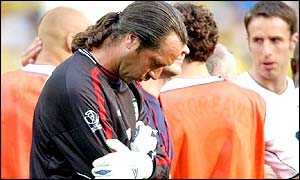 England crash out of the World Cup 2-1 to Brazil in the quarter-finals as Seaman, complete with long ponytail, rues the goal which got the better of him