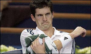 Tim Henman was beaten 6-4 6-2 in round three of the Paris Masters by local favourite Nicolas Escude