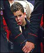 A child watches the rescue effort