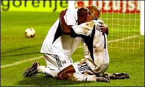 Fulham's Luis Boa Morte and Steve Marlet celebrate the 3-0 defeat of Dinamo Zagreb