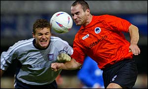 Ipswich keeper Andy Marshall challengesSlovan Liberec's Miroslav Slepicka 