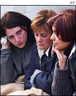 Women waiting by the school