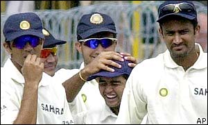 Indian wicket keeper Parthiv Patel is given a pat on the head by skipper Sourav Ganguly after he catches and dismisses West Indies captain Calrl Hooper