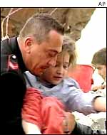 Carabinieri policeman rescues girl from rubble