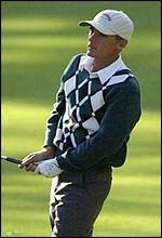 Charles Howell III watches his shot from the 14th fairway during round two of the USPGA Tour Championship