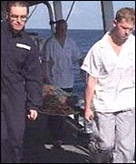 Navy crew attend to Mr Peter