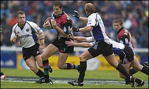 Will Greenwood powers clear of the Bath defence