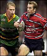 Gloucester wing James Simpson-Daniel (right) cuts inside Northampton's Mark Tucker 