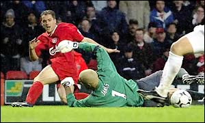Michael Owen scores twice as Liverpool stay top of the Premiership
