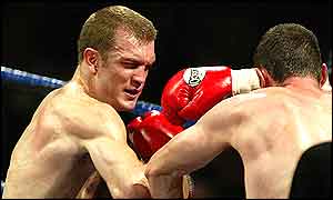 Neil Sinclair (left) piling in the punches to Paul Knights