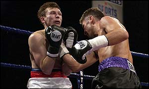 McCullough lands with good uppercuts early on in the fight