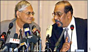 G L Peiris, left, and Anton Balasingham