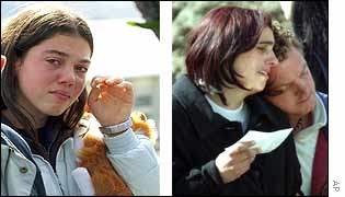 Young girl wipes away 