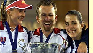 Slovakia captain Tomas Malik with players Daniela Hantuchova (left) and Janette Husarova