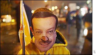 Child wearing mask of AK leader Recep Tayyip Erdogan 