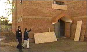 Syedd Shareef shows PC Osoba some recent damage 